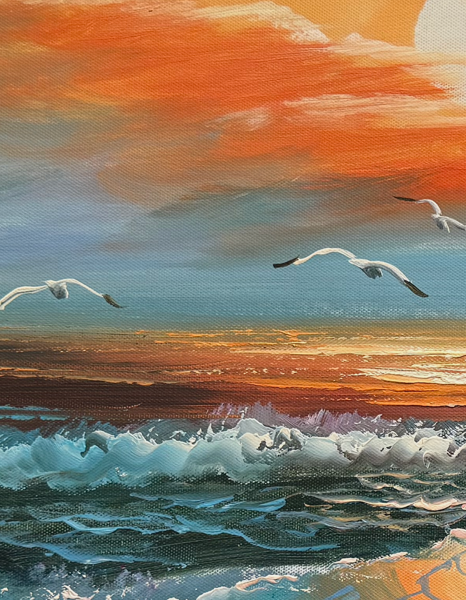 Painting of a sunset over the ocean with birds flying.
