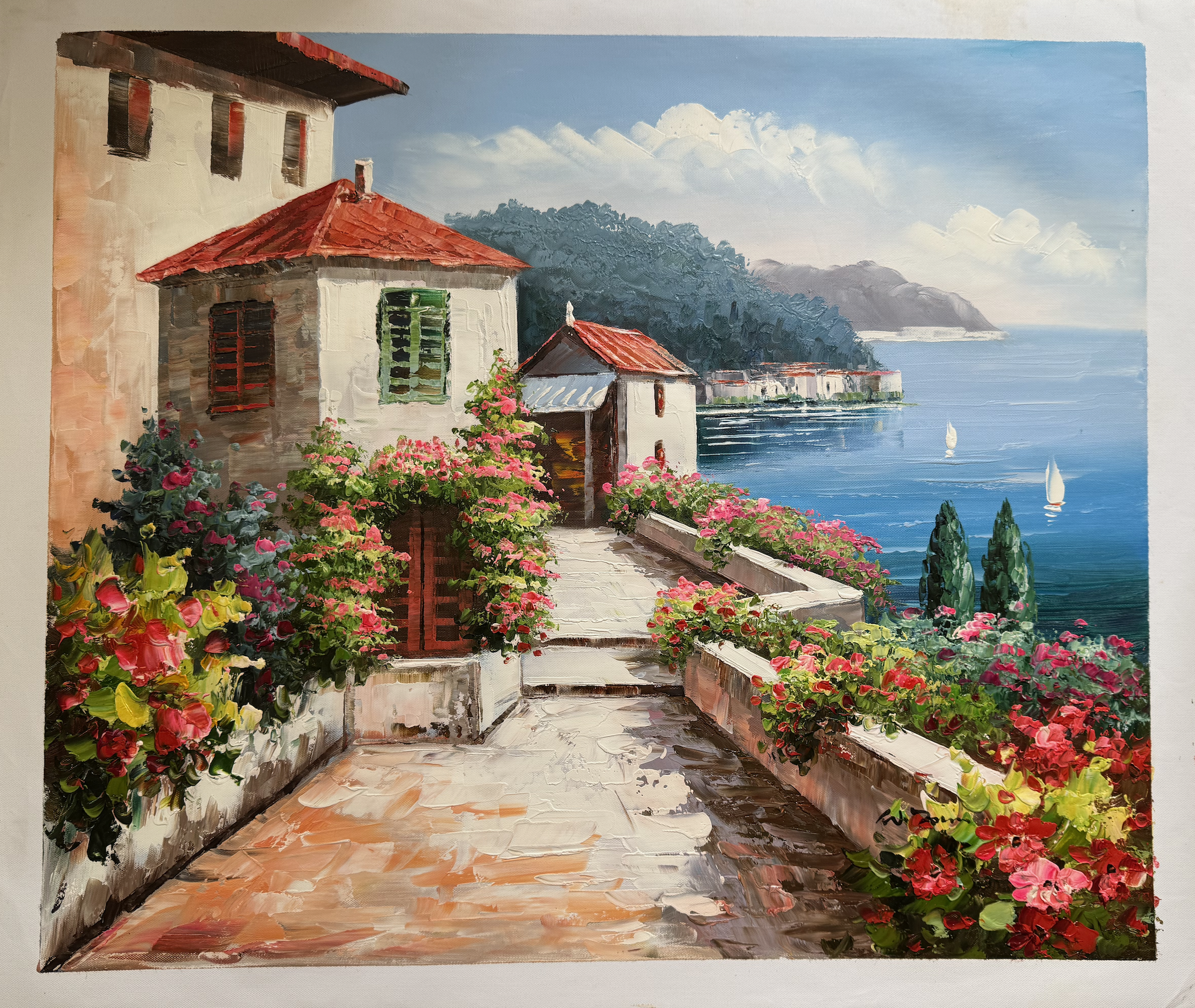 Painting of a coastal scene with houses, flowers, and a body of water.
