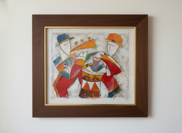 Framed abstract artwork of three figures on a white wall