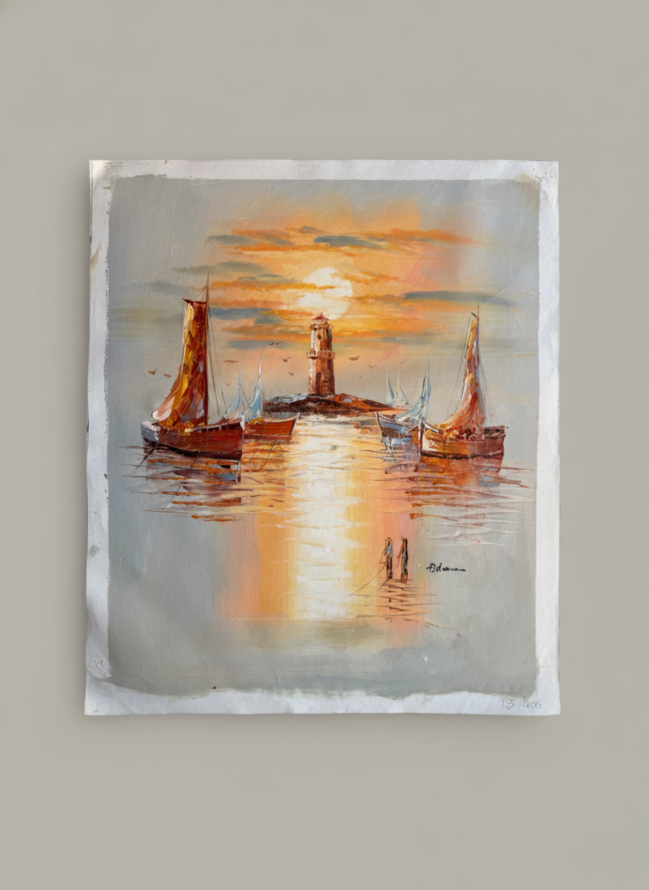 Painting of a lighthouse with boats at sunset on a plain wall.