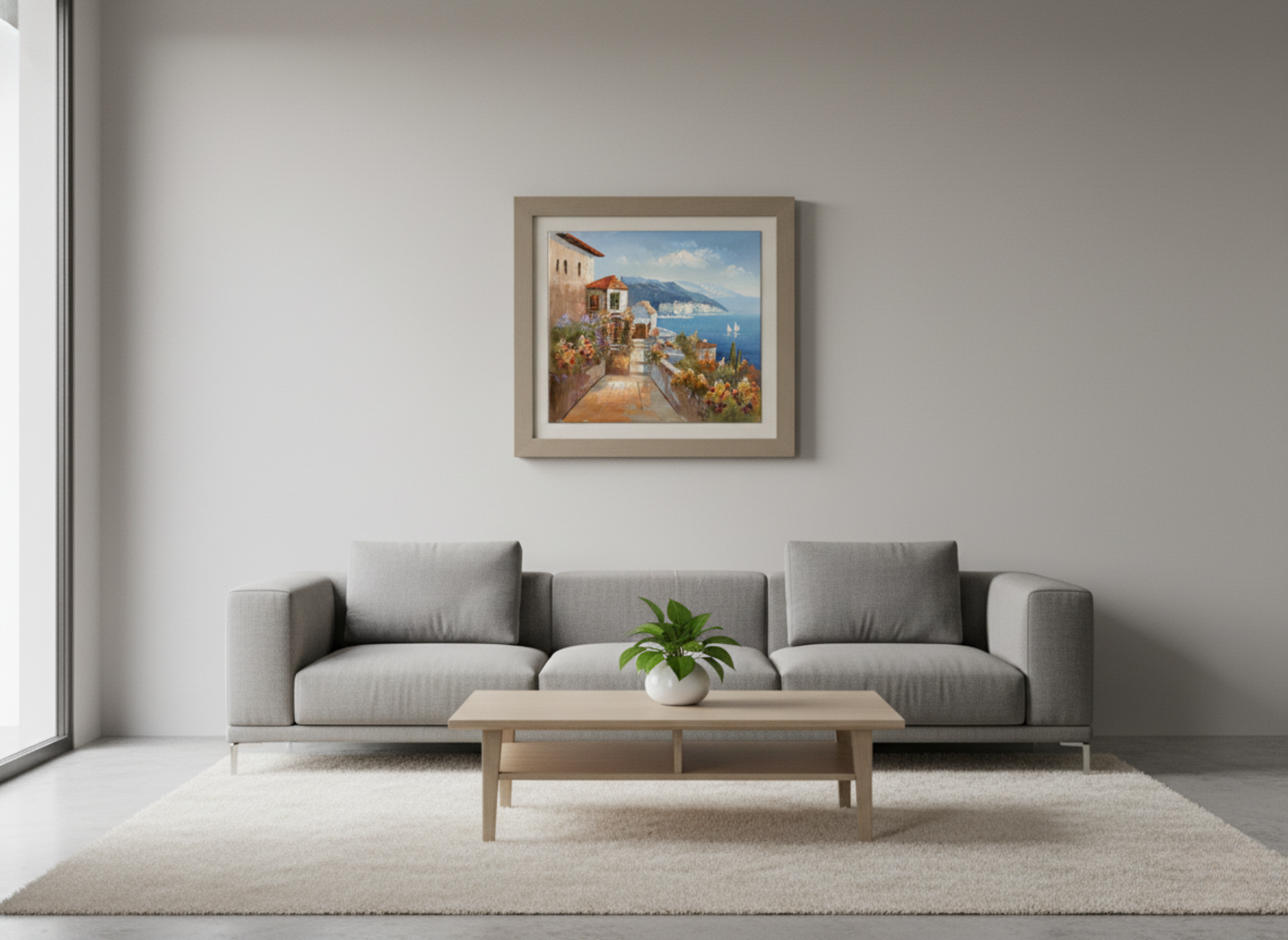 Modern living room with a gray sofa, wooden coffee table, and framed artwork on the wall.