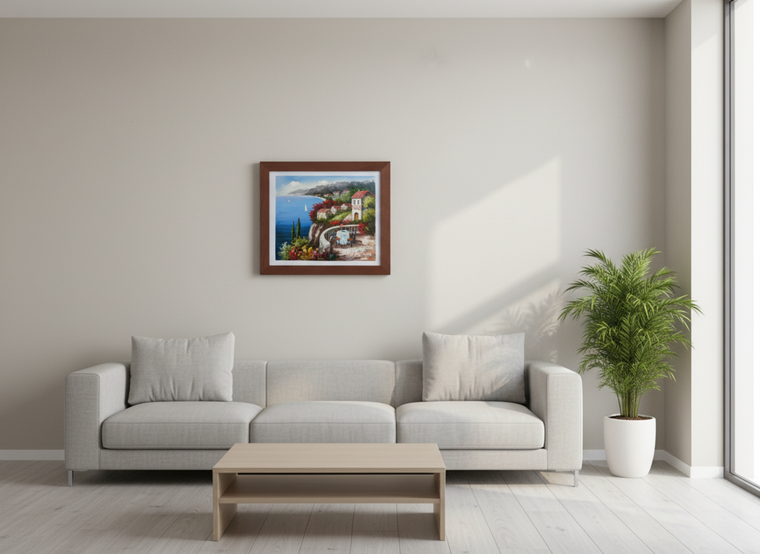 Modern living room with a gray sofa, coffee table, and framed artwork on the wall.