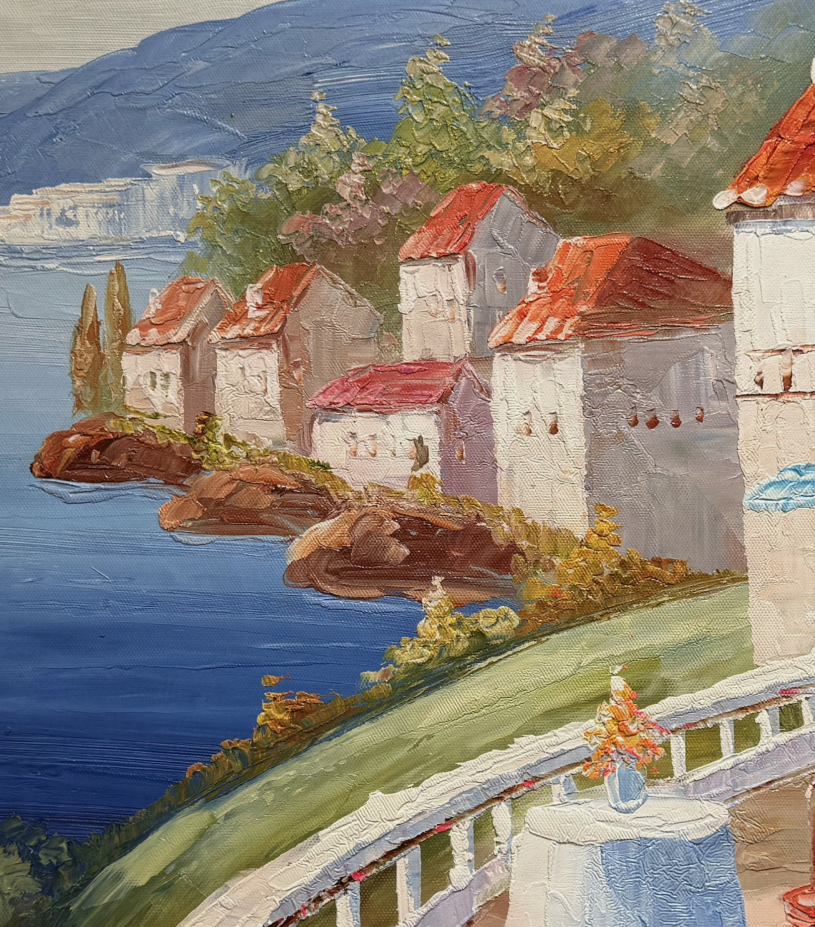 Painting of a coastal scene with houses and a body of water.