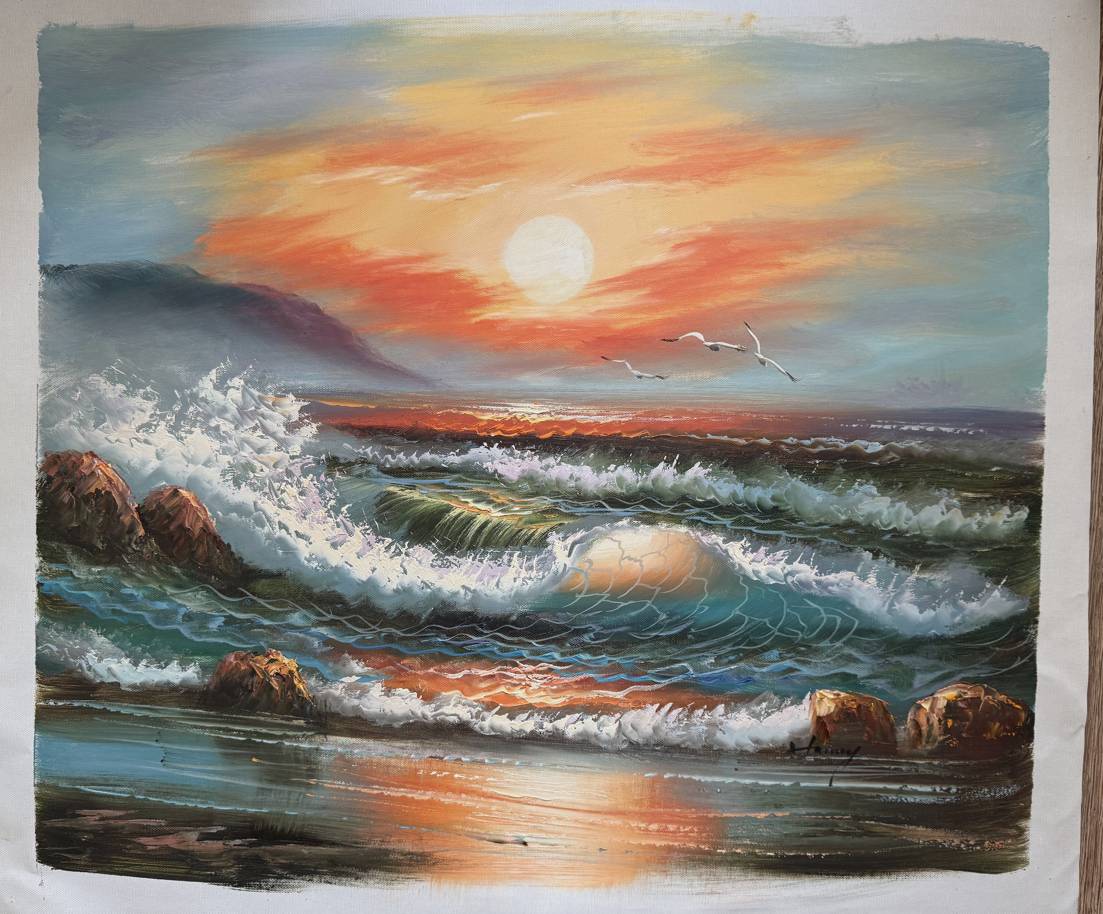 Painting of a sunset over the ocean with waves and rocks.